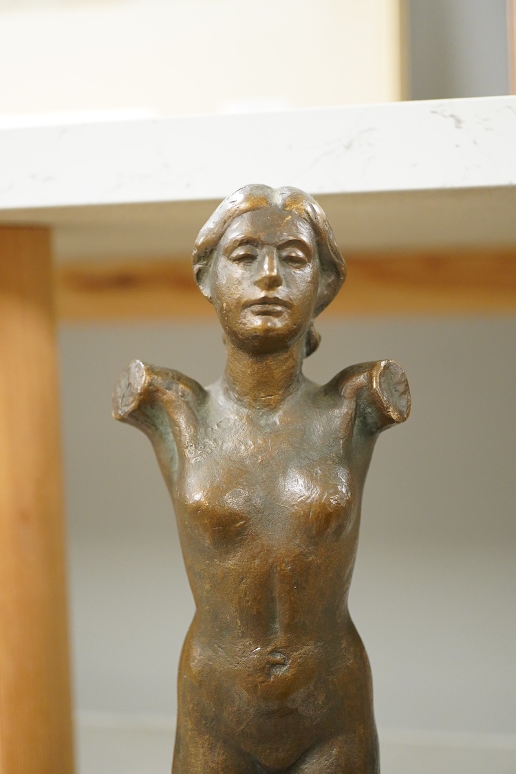 R. Schmitz, a German bronze study of a lady, raised on stepped base, 35cm high